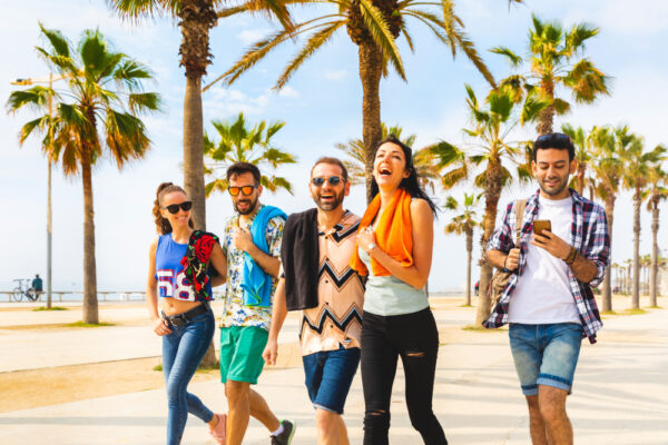 Happy,Friends,On,Seaside,Walk,In,Barcelona.,Multiracial,Group,Of